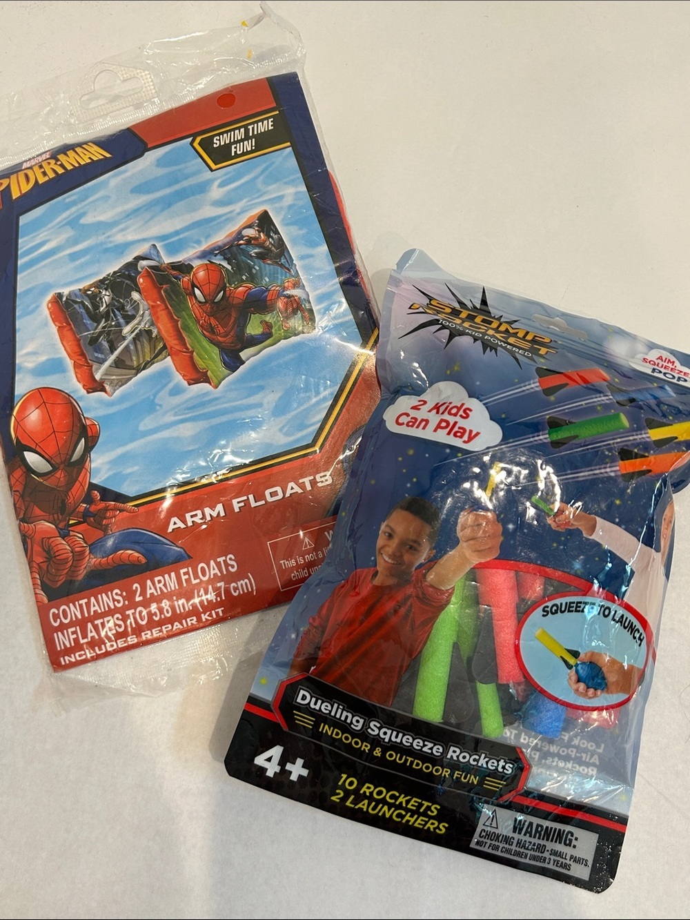 Spiderman pool Arm Floats swim & Multicolor Squeeze Rockets 10 rockets new boys